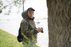 Nevio Bozzato, fotografo, uomo con fotocamera